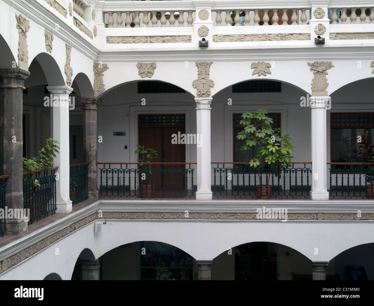 upper floor balcony of old part of palacio Municipal, Quito, Ecuador Stock Photo