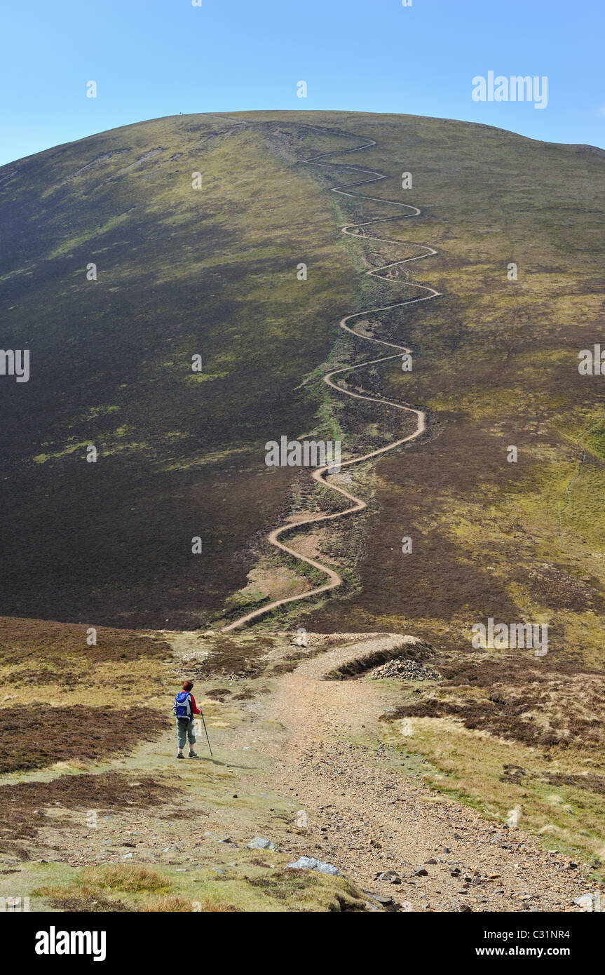 The long snaking path up to the summit of Sail from Scar Crags, Lake District Fells Stock Photo