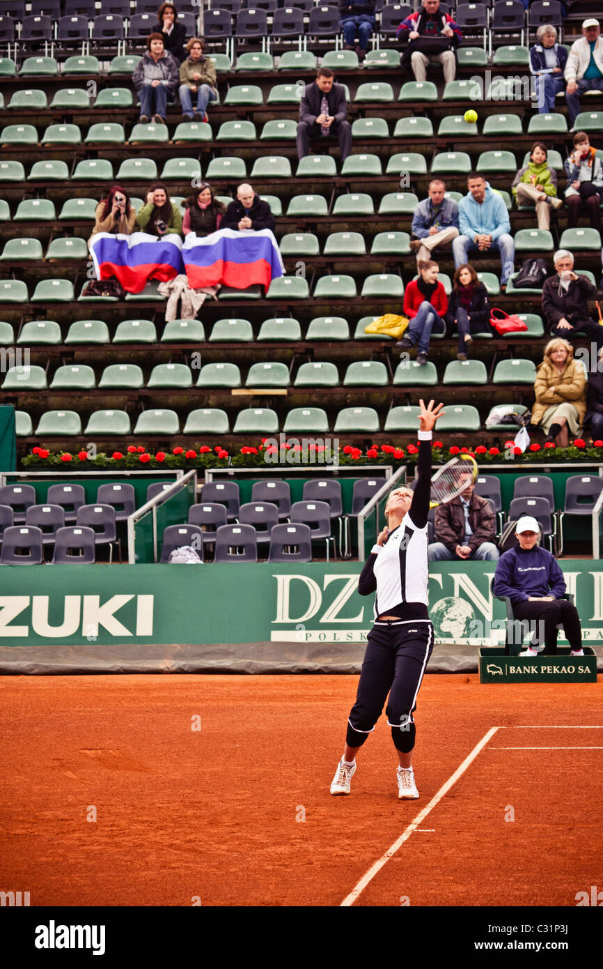 Elena Dementieva serving in a match vs Agnieszka Radwańska Stock Photo