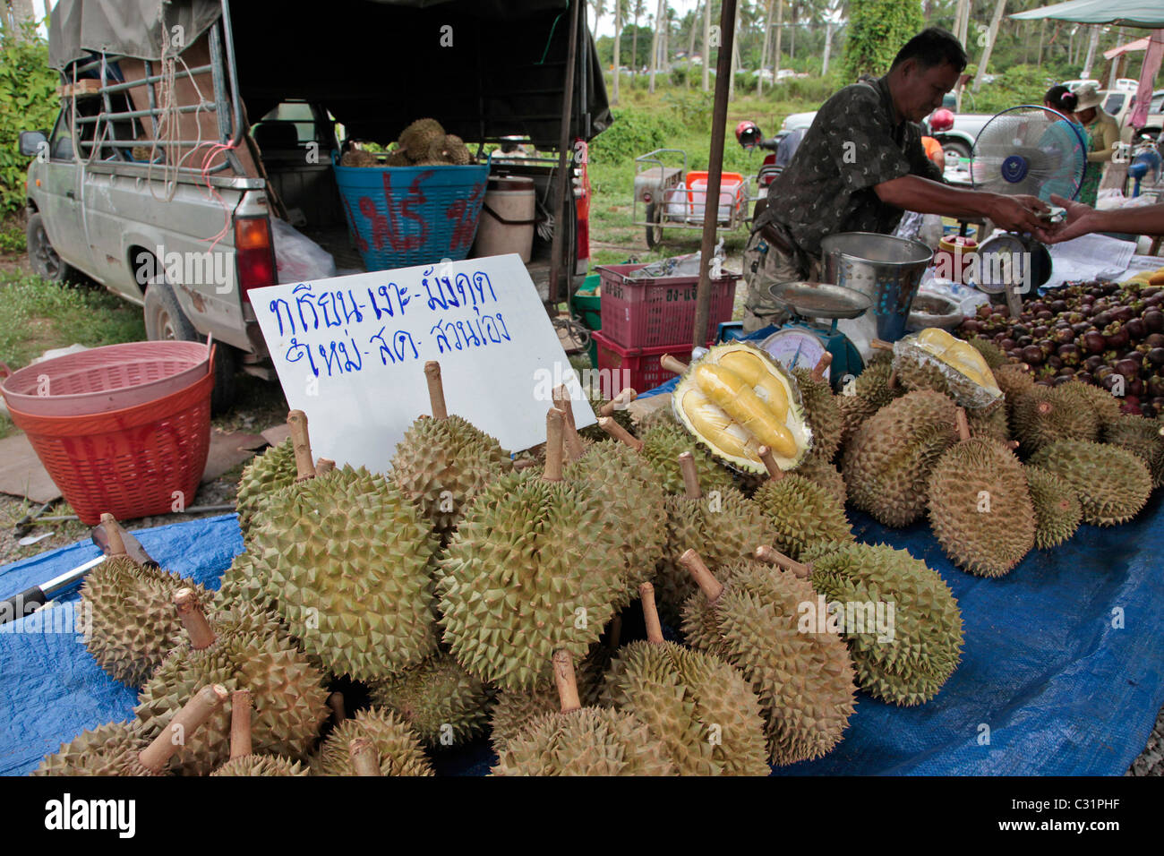DURIANS FOR SALE, TROPICAL FRUIT WITH A VERY STRONG SMELL, IN THE