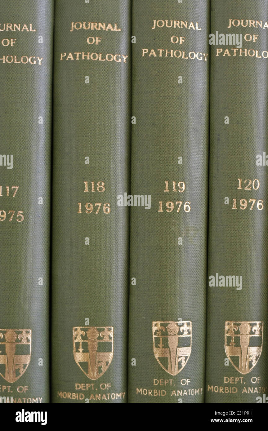 Old pathology journals in a library Stock Photo