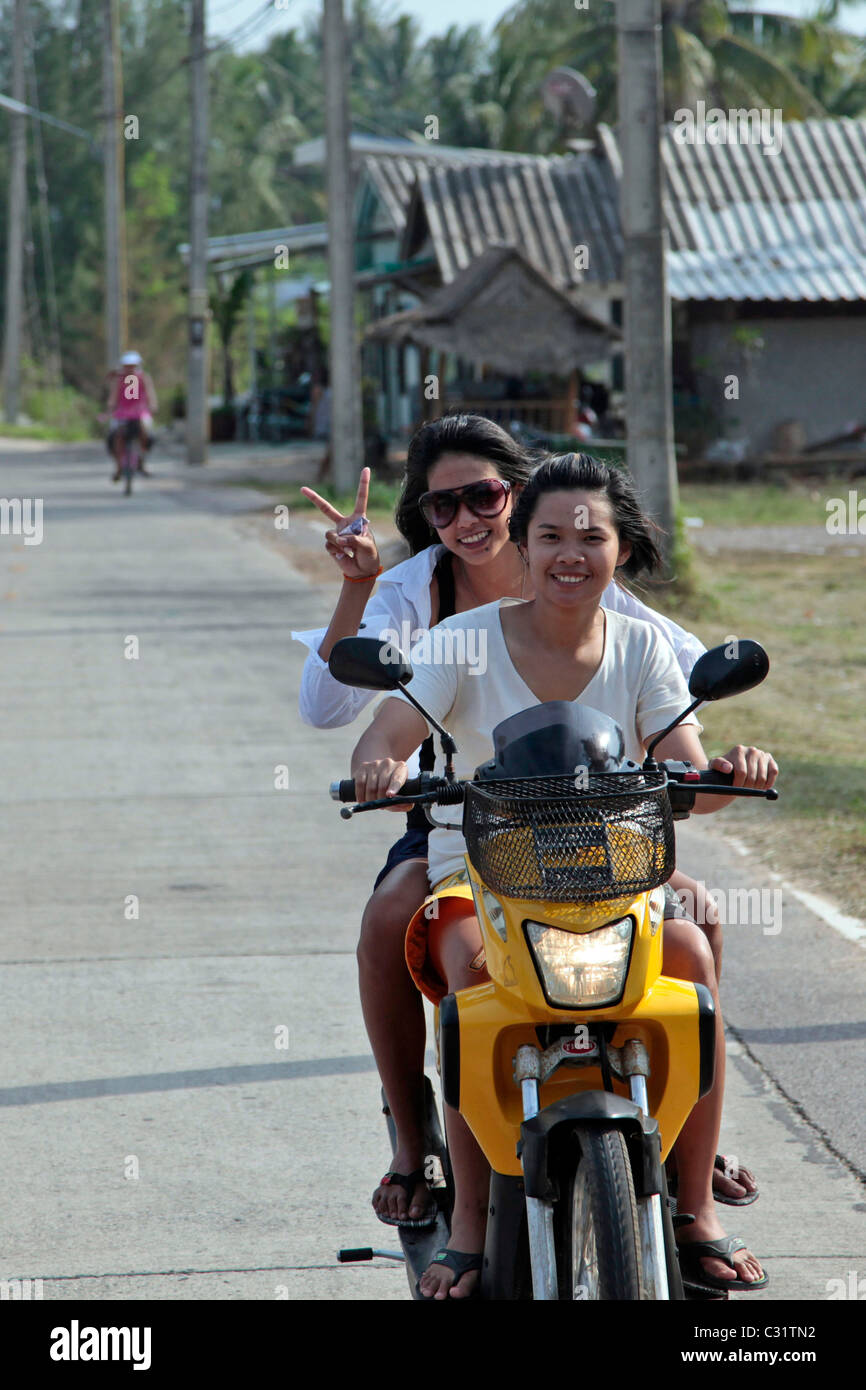 Young girl on moped asia hires stock photography and images Alamy