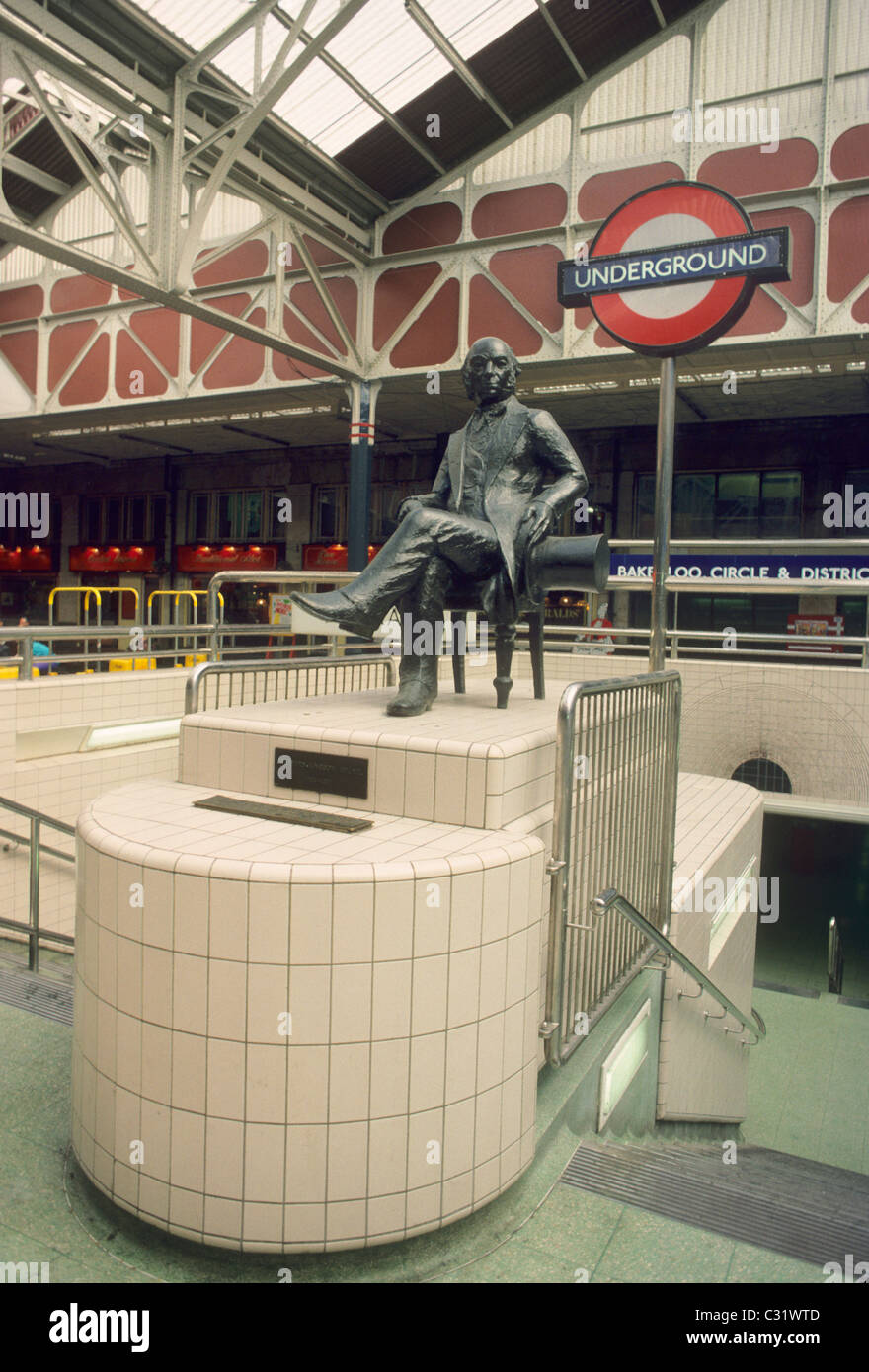 Paddington Railway Station, I. K. Brunel Statue, Underground Entrance London England UK English stations statues seated figure Stock Photo
