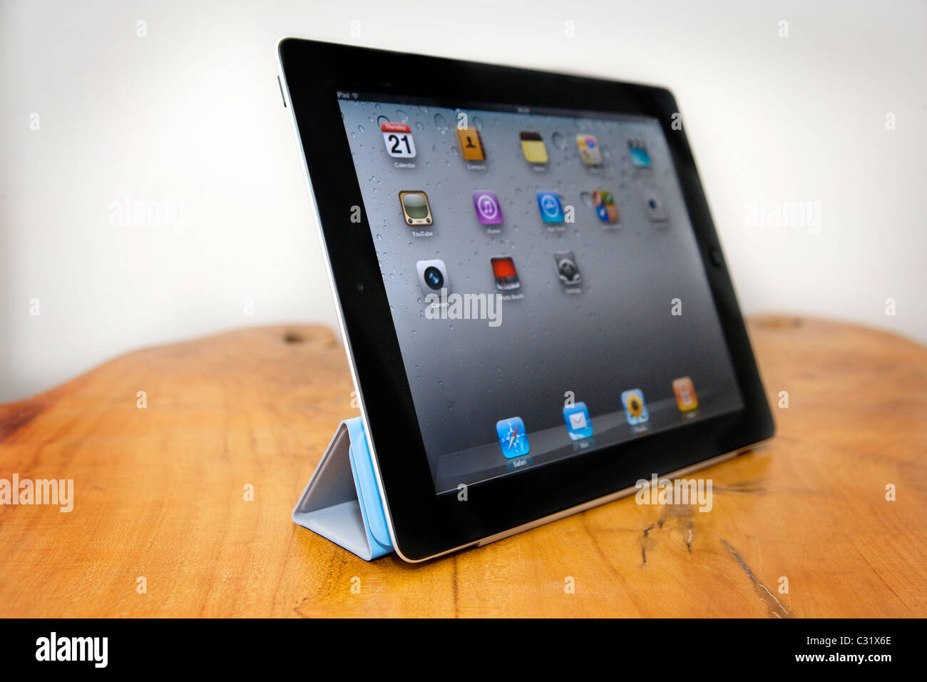An iPad 2 using the smart cover as a stand Stock Photo