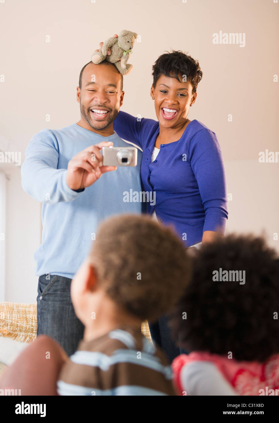 Three black children, mother hi-res stock photography and images - Alamy