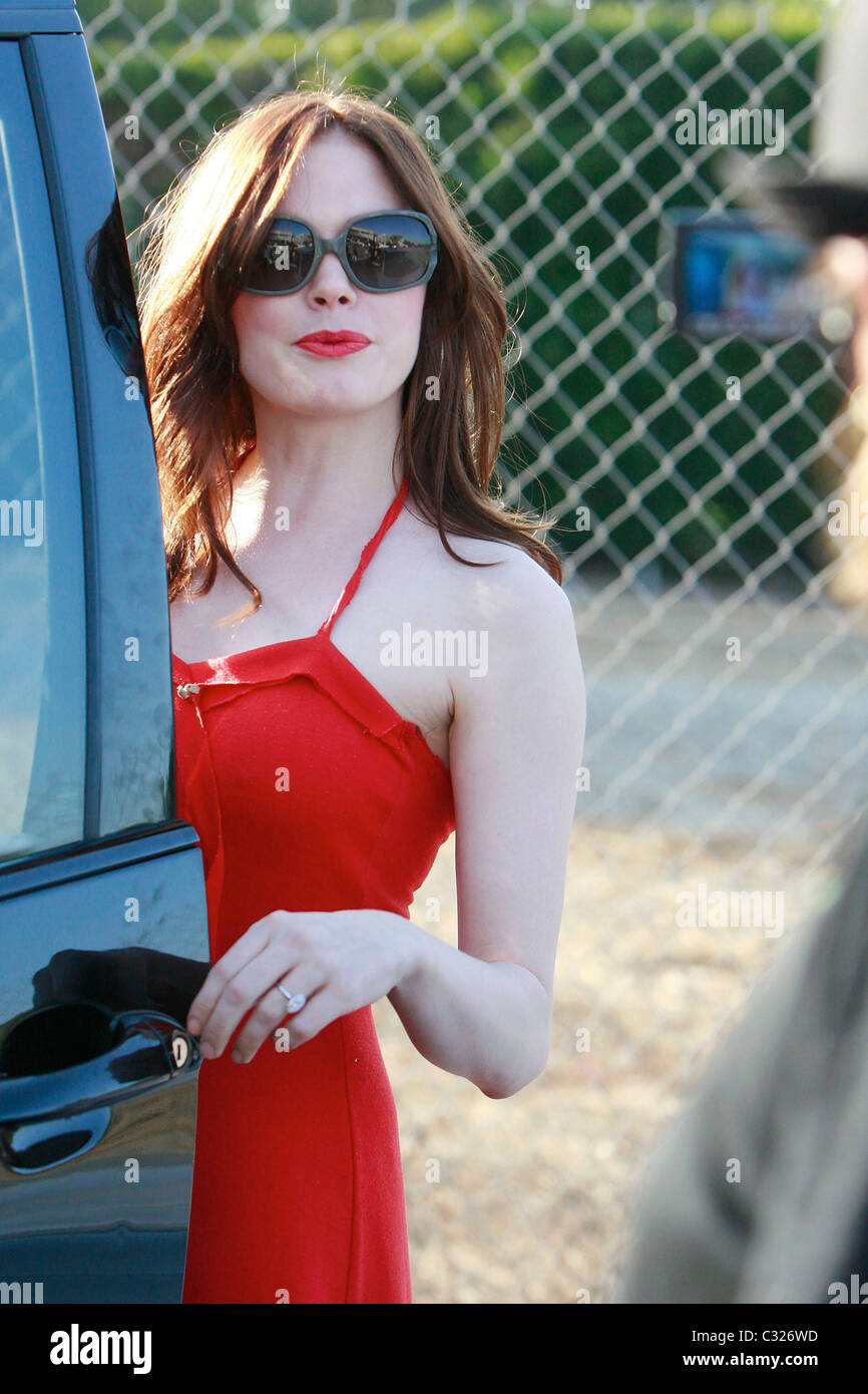Rose Mcgowan who is about to film the action movie 'Red Sonja' next year,  gets into character wearing a bright red dress as she Stock Photo - Alamy