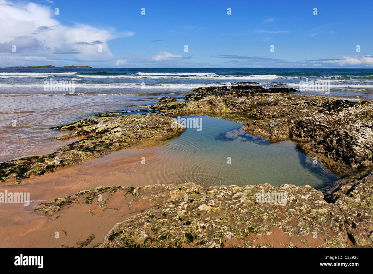 Rock pools and beach at the White Rocks in County Antrim. Stock Photo