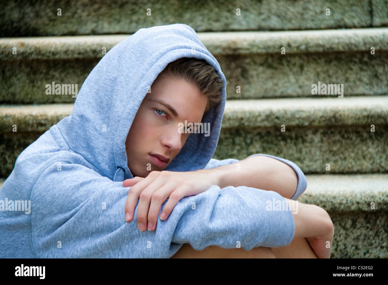 Young man with laptop computer outdoors Stock Photo