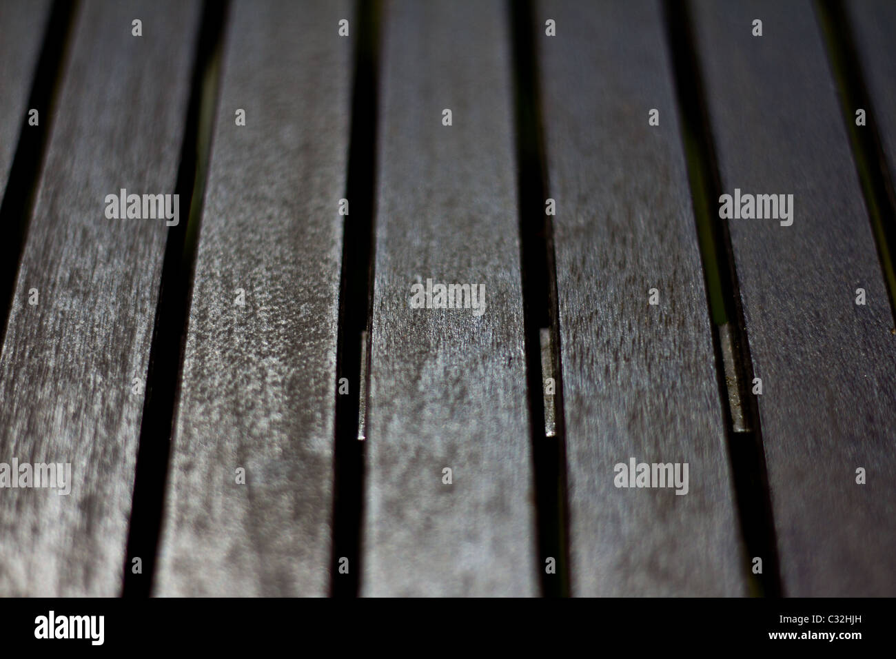 Close up of straight wooden lines on an outside table. Abstract. Stock Photo