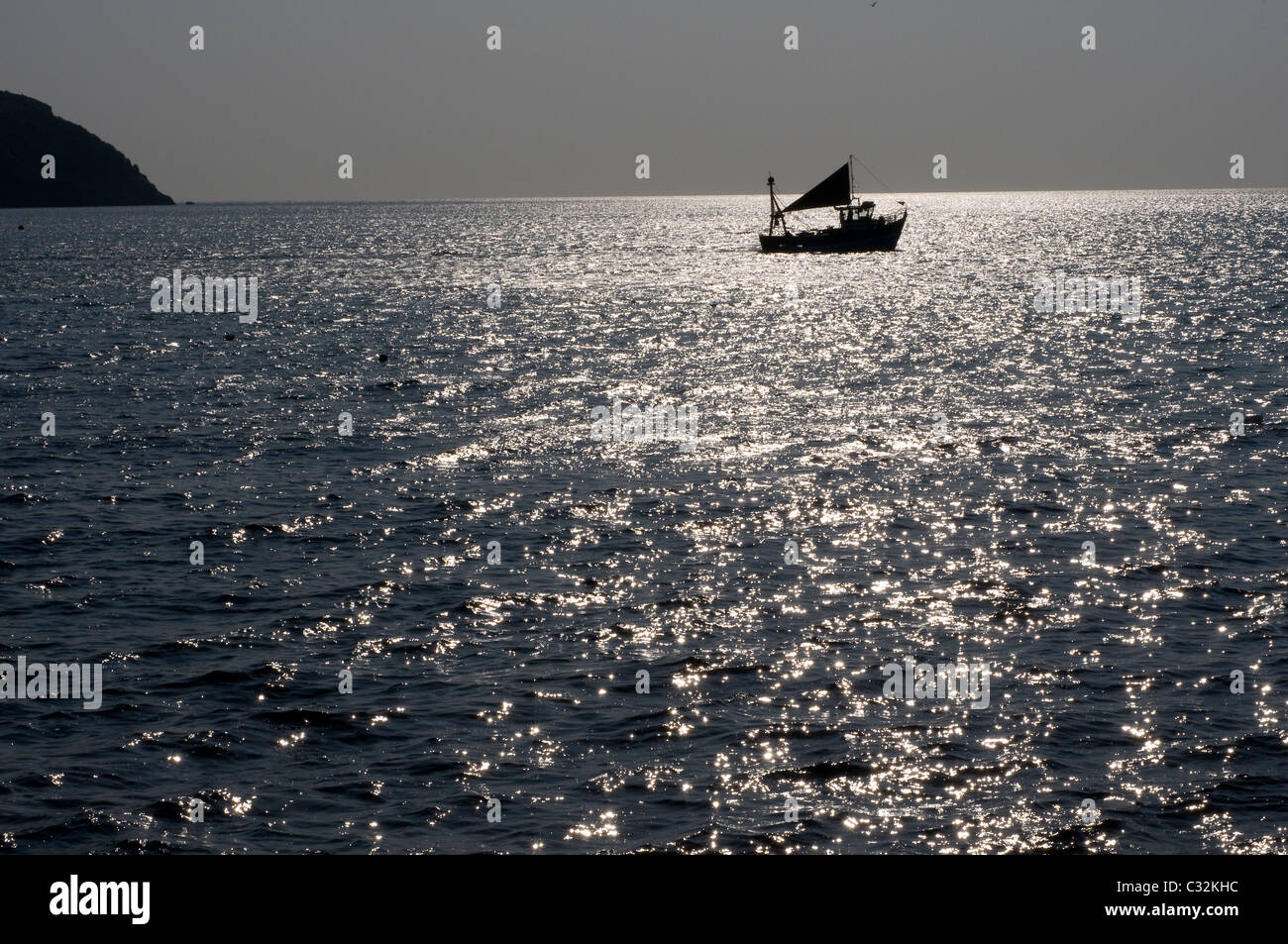 Fishing boat near the coast of Torquay,Devon, silhouette, horizon, sea