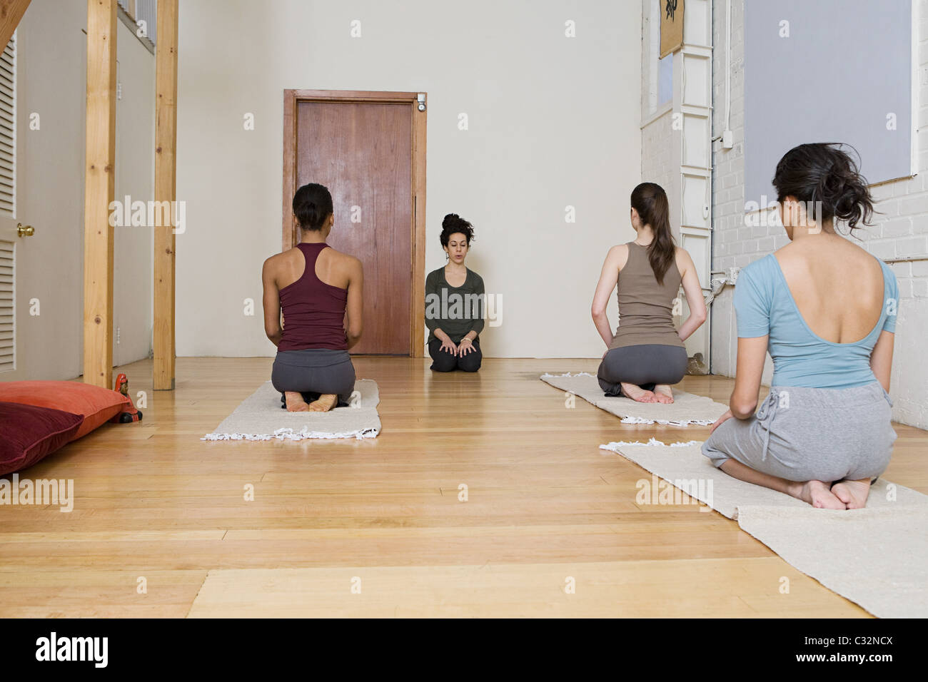 Women practising yoga Stock Photo
