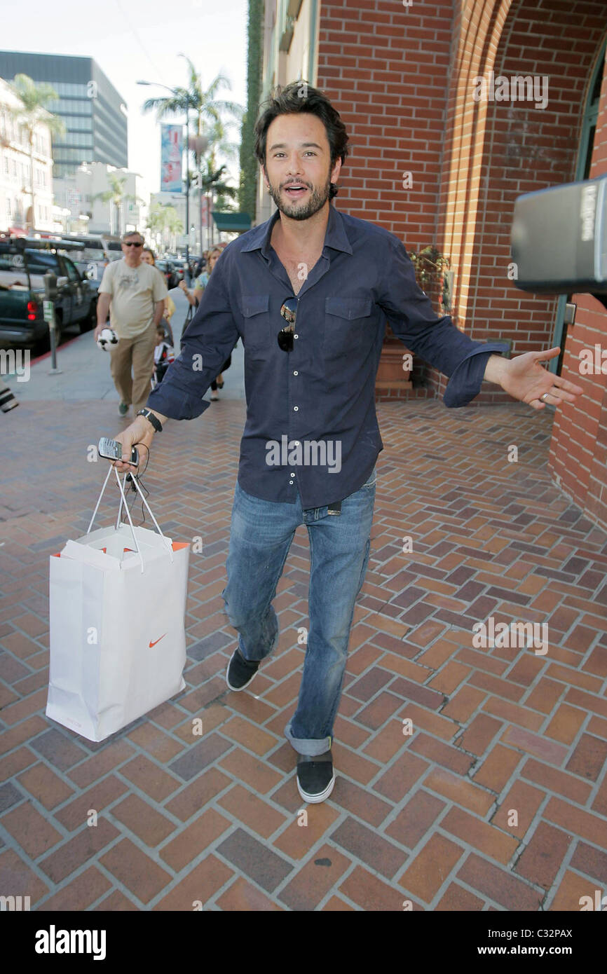 Rodrigo Santoro leaving a medical building in Beverly Hills carrying a