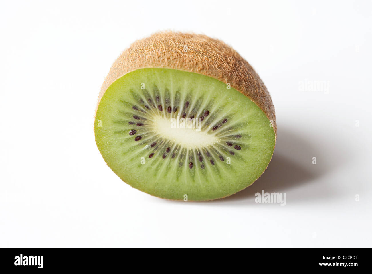 Half a kiwi on white background Stock Photo