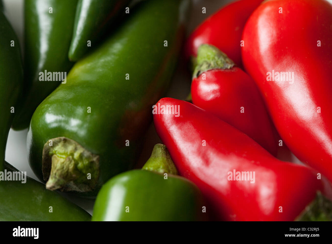 Green and red chilli peppers, full frame Stock Photo
