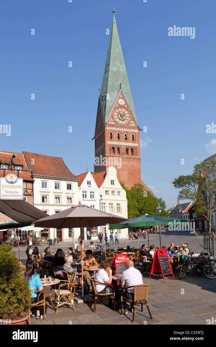the square Am Sande with Johannis Church, Lueneburg, Lower Saxony, Germany Stock Photo