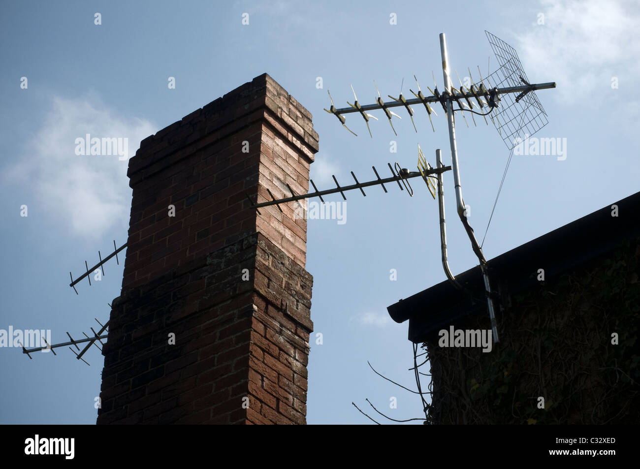 tv areals and chimney stack,television, tv television licence, aerial, aerials, roof, abstract, brickwork, Stock Photo