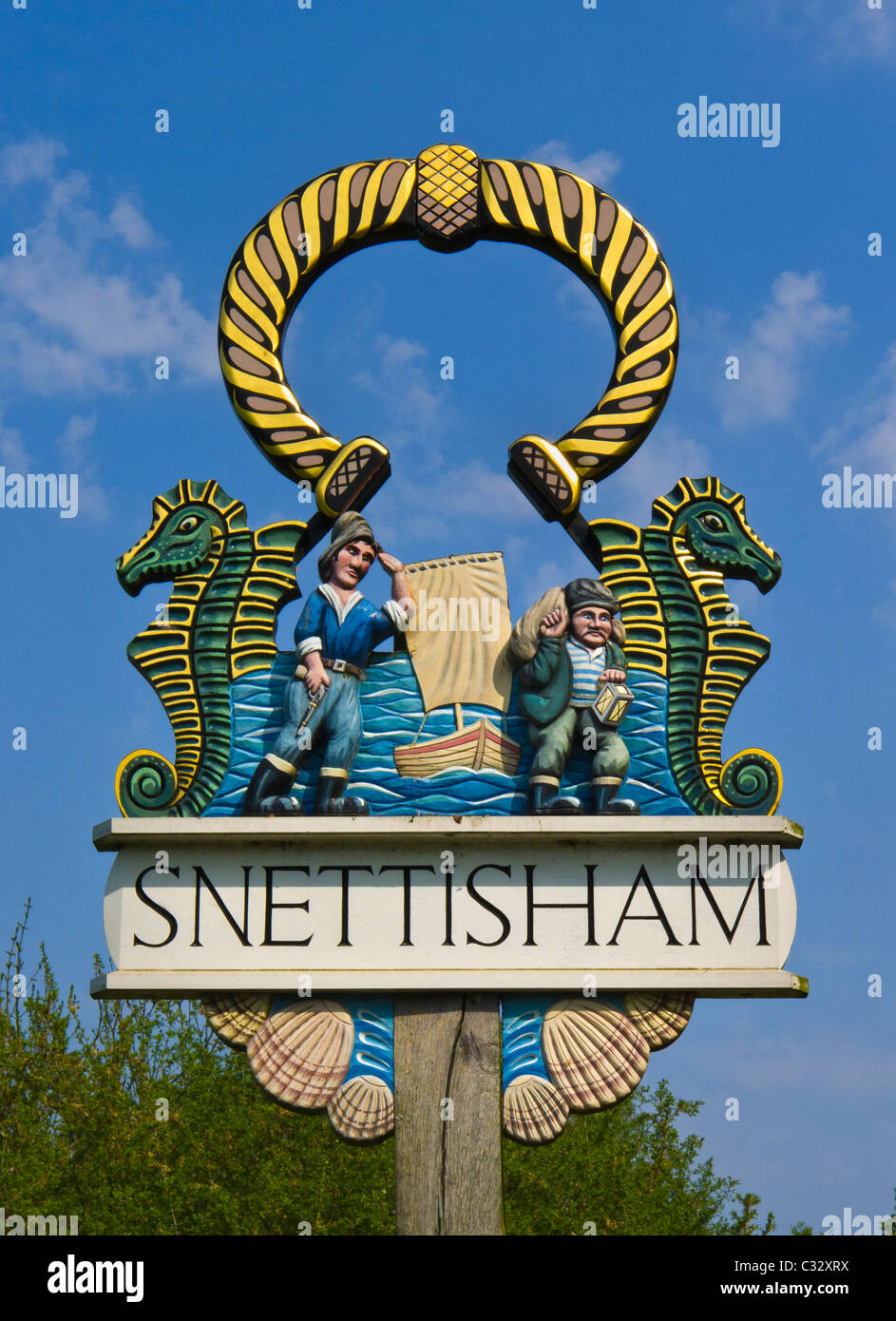 The village sign at Snettisham, Norfolk. Stock Photo