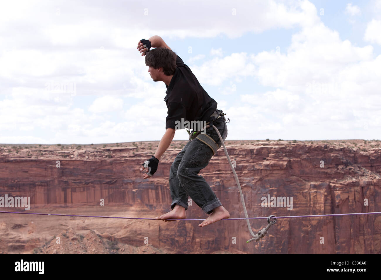 Highlining at the Fruit Bowl in Moab, Utah Stock Photo Alamy