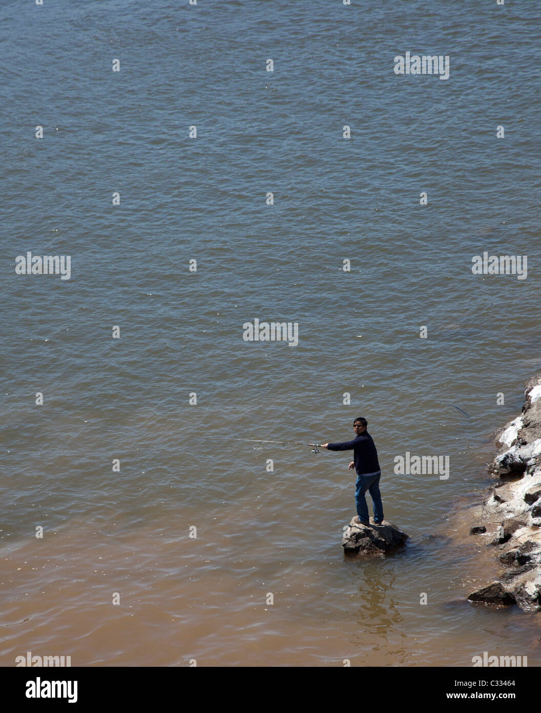 Lenoir City, Tennessee - A fisherman below the Tennessee Valley Authority's Fort Loudoun Dam on the Tennessee River. Stock Photo
