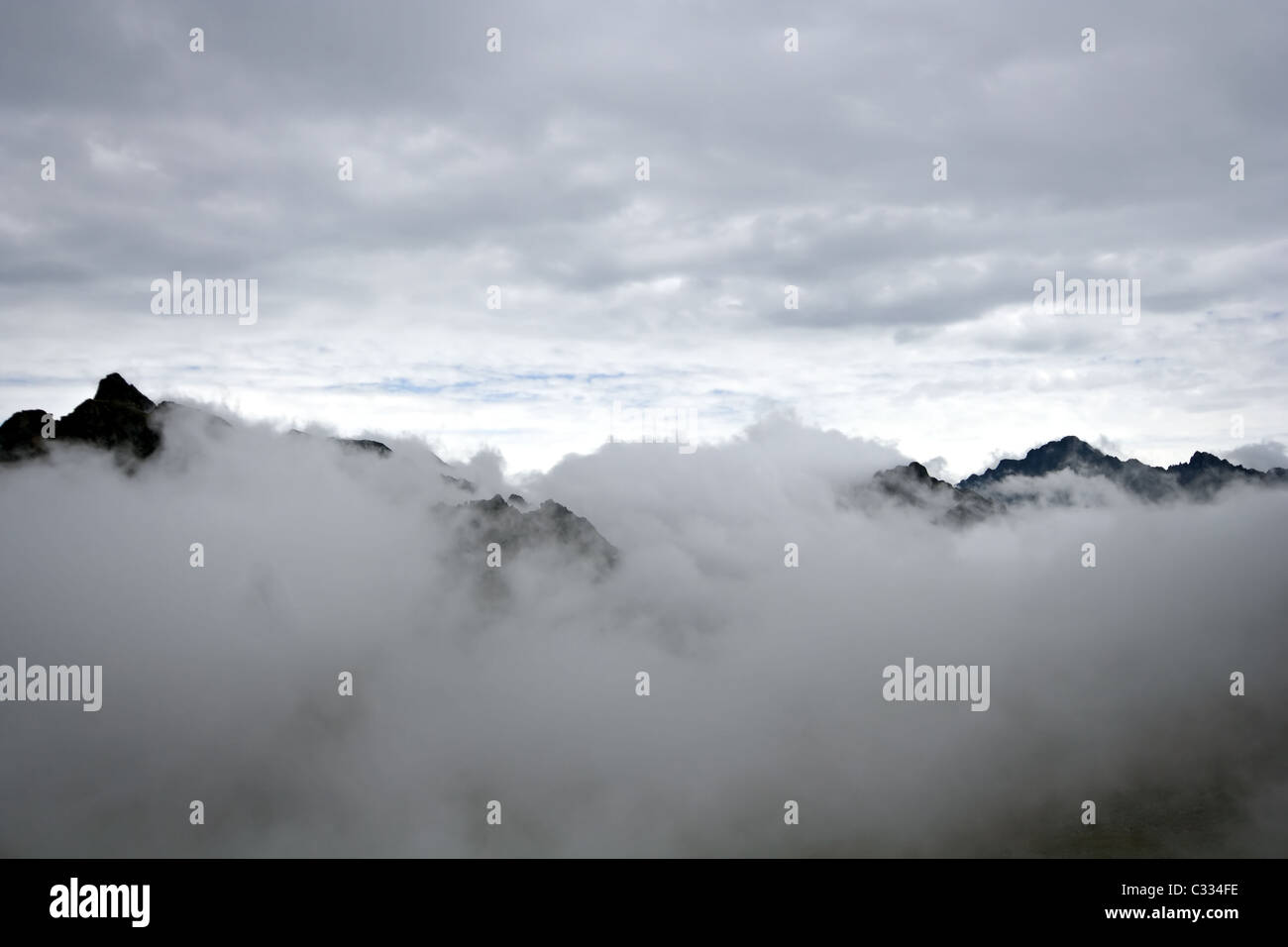 Thunderstorm in wild Siberia nature, landscape with fog. East Sayan mountains. Buryat republic. Tunkinskie Goltsy area.Russia. . Stock Photo