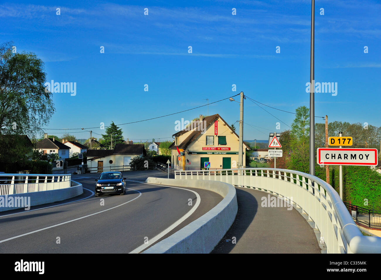 Charmoy The entrance to Charmoy village, France, with car in the scene Stock ...
