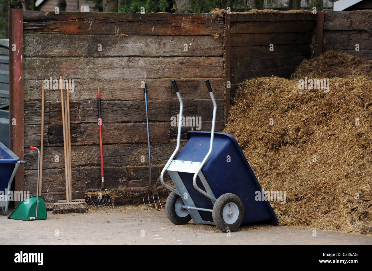 A Muck Heap and tools on a Horse Yard Stock Photo Alamy