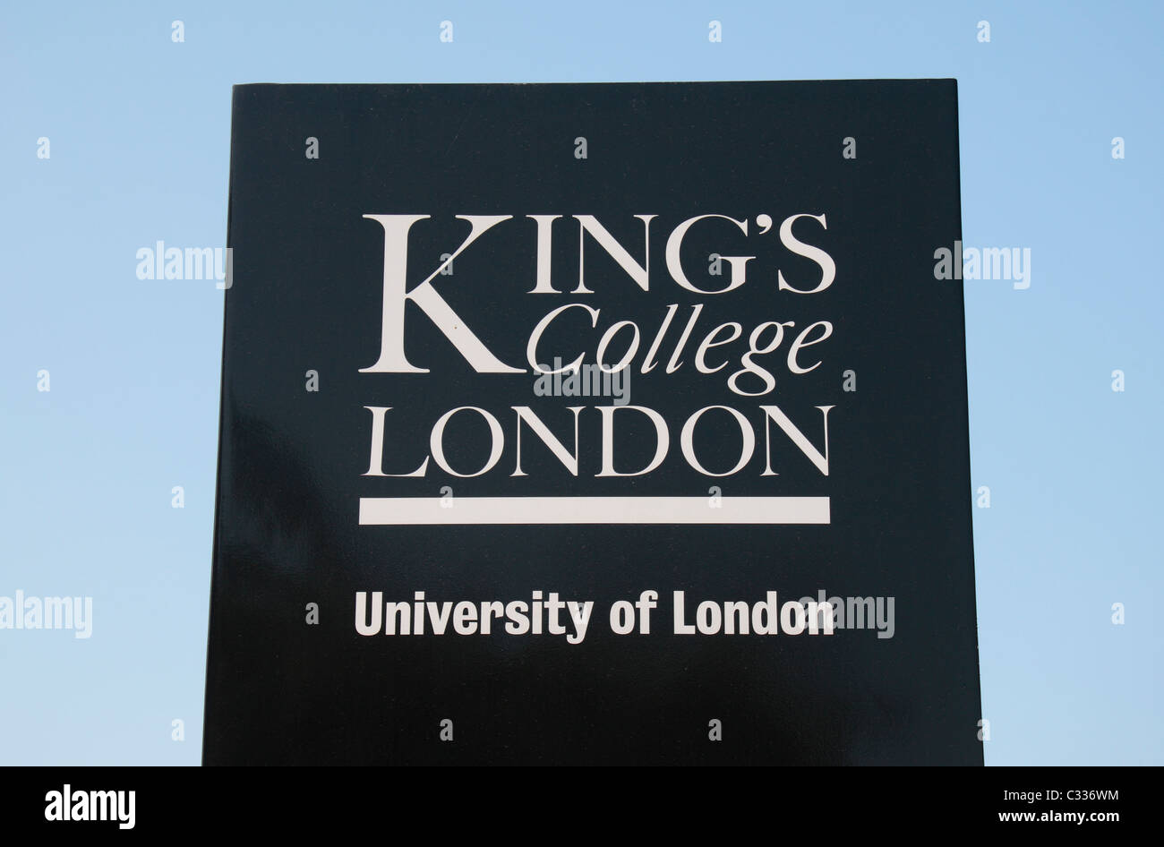 Sign for King's College London, University of London against a light blue sky. Stock Photo