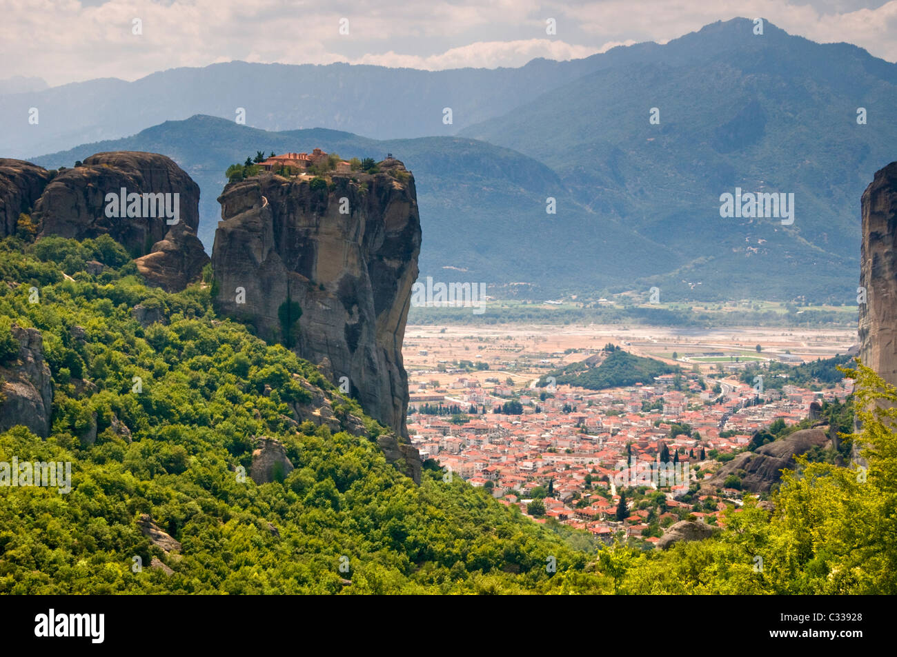 The Monastery of the Holy Trinity & Town of Kalabaka, Meteora Mountains, Meteora, Plain of Thassaly, Greece, Europe Stock Photo