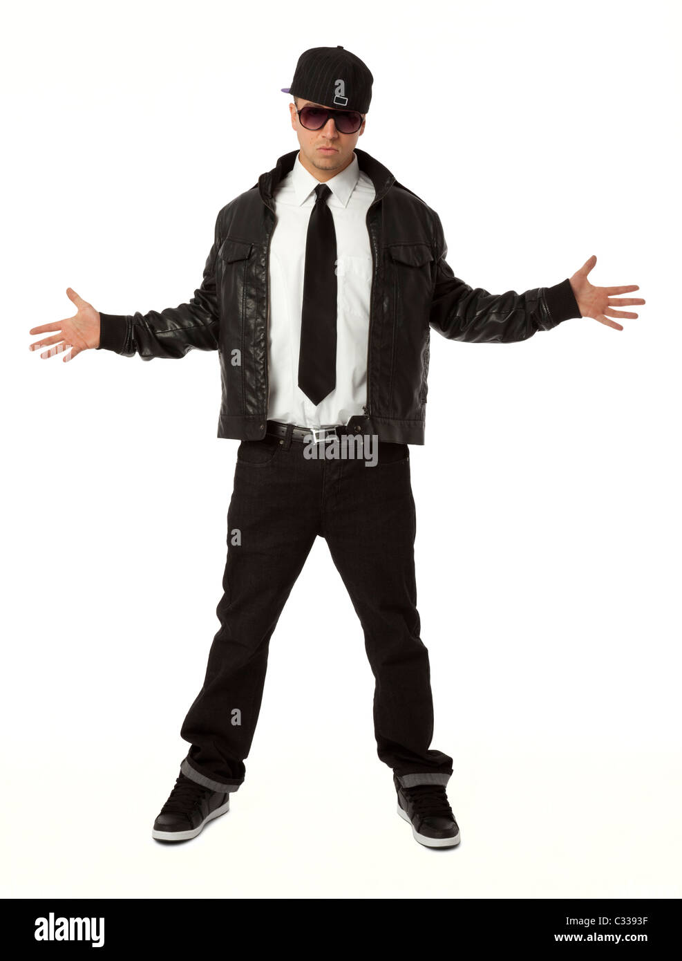 Full length front view of young adult hip hop male on white background. Stock Photo