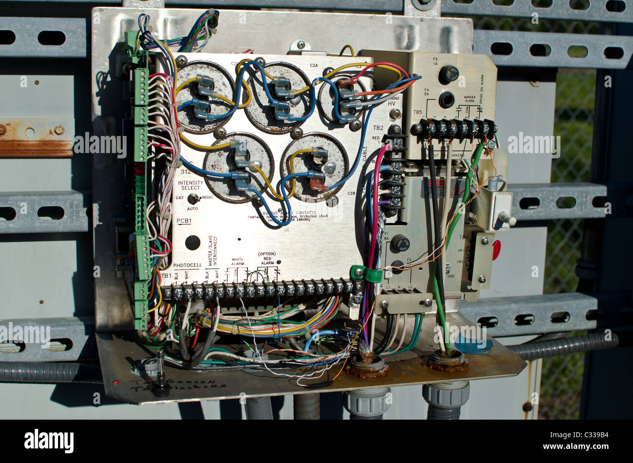 Flash lighting controller for a wireless telecom tower. Stock Photo