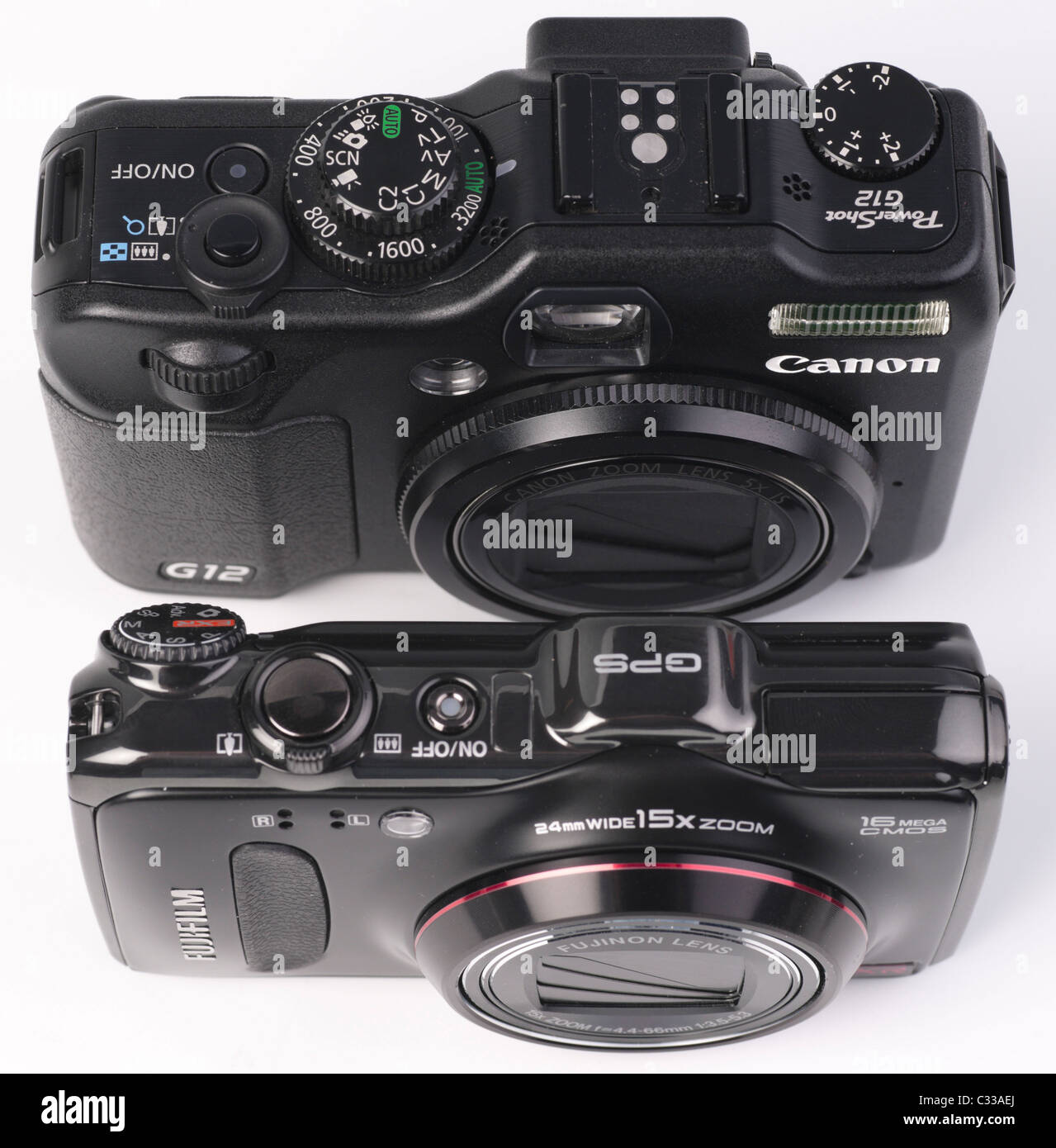 Photo equipment - Canon G12 and Fuji F550 EXR camera sizes compared Stock Photo