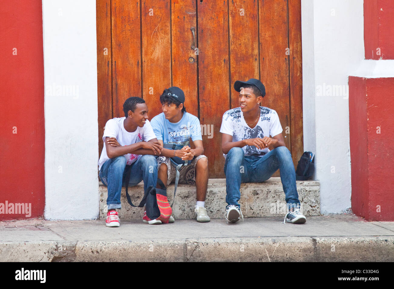 Teenage Colombian boys in the old town, Cartagena, Colombia Stock Photo