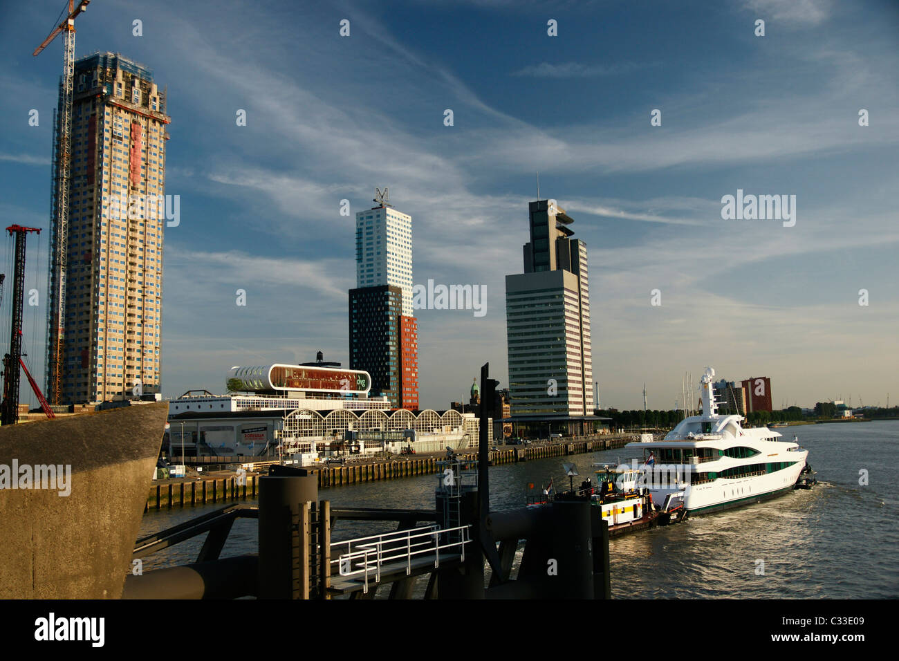 Katendrecht district in Rotterdam Netherlands skyline with skyscrapers tall buildings modern urban architecture under blue sky Stock Photo