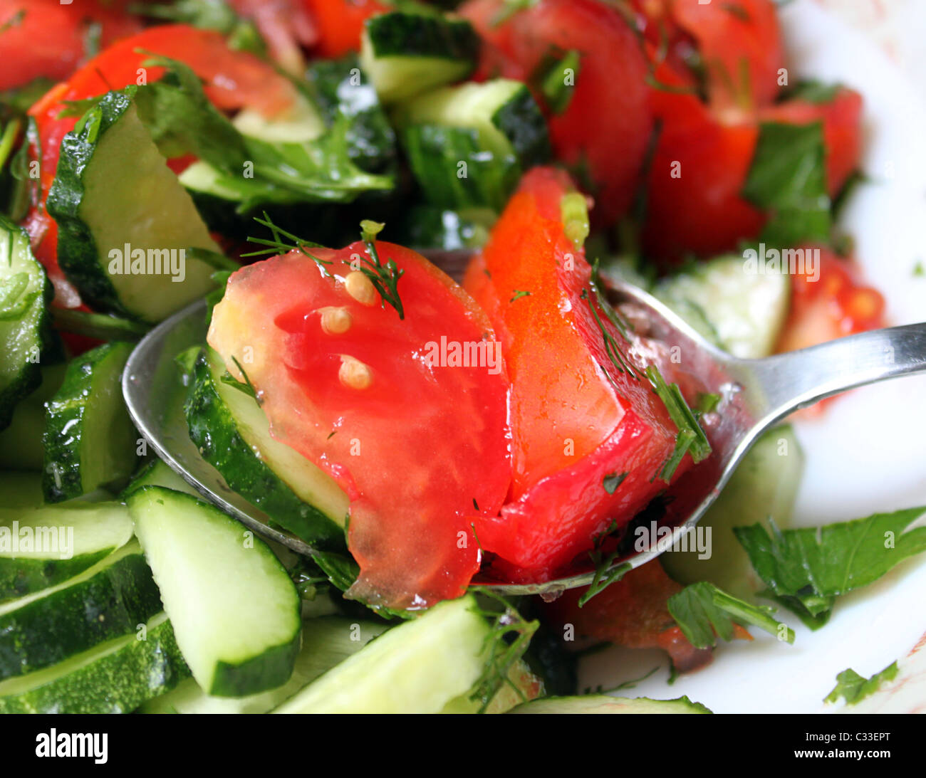 salad with tomatoes and cucumbers Stock Photo - Alamy