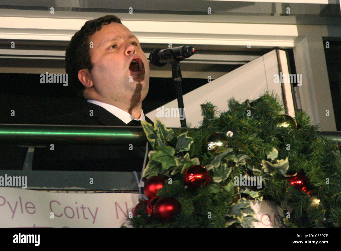 Britain's Got Talent winner Paul Potts performs at the Bridgend Designer Outlet Christmas lights switching on ceremony Stock Photo