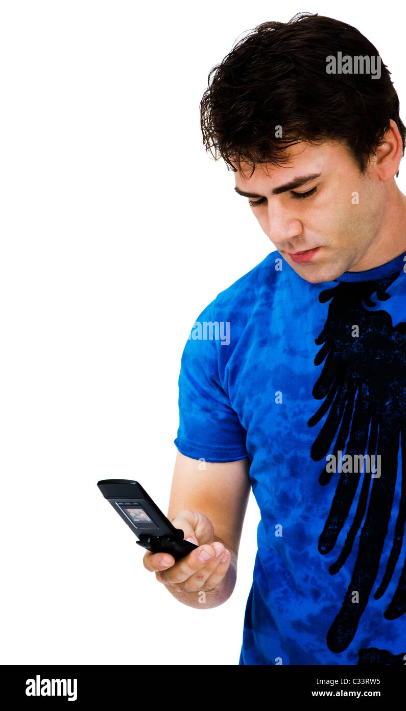 Handsome man text messaging on a mobile phone isolated over white Stock Photo