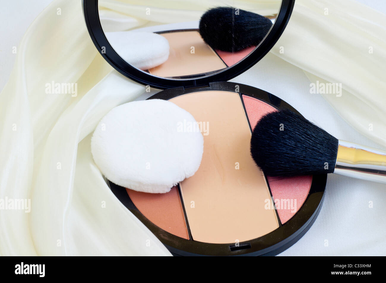 makeup brushes and blush on white background Stock Photo