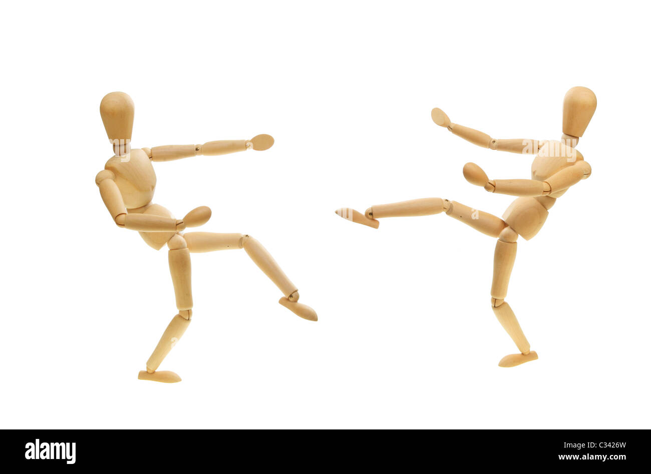 Two artists manikins in martial arts combat Stock Photo - Alamy