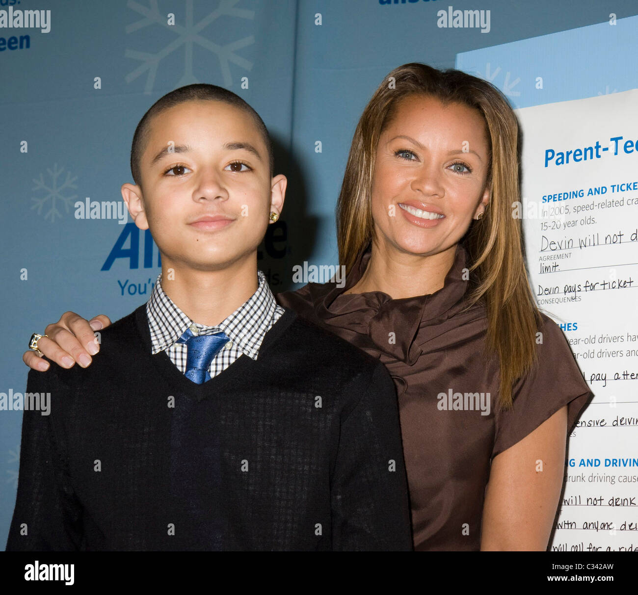 Actress Vanessa Williams and son Devin Hervey sign the Allstate News  Photo - Getty Images