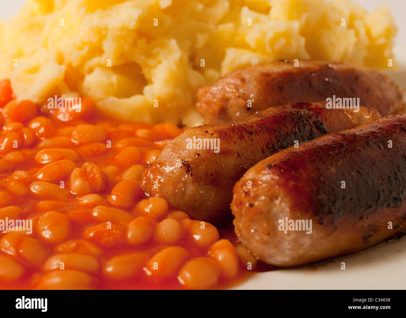 Sausage mashed potato and baked beans Stock Photo
