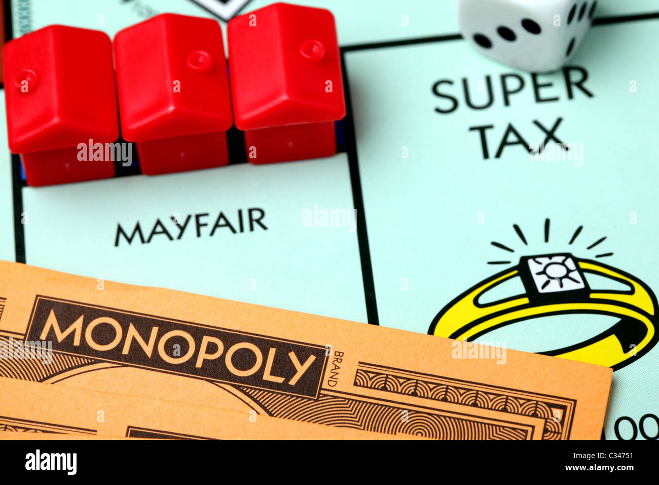 Mayfair and Super Tax on the Monopoly board Stock Photo