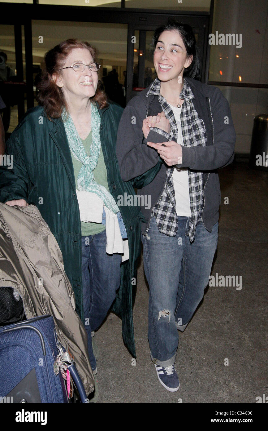 Sarah Silverman, her mother Beth Ann O'Hara, and adopted brother arrive