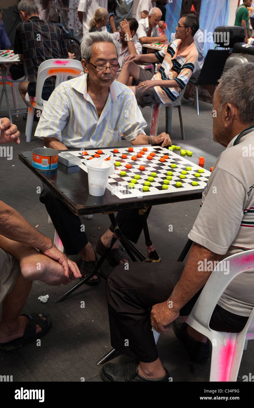 Chinatown, Singapore - men playing checkers Stock Photo