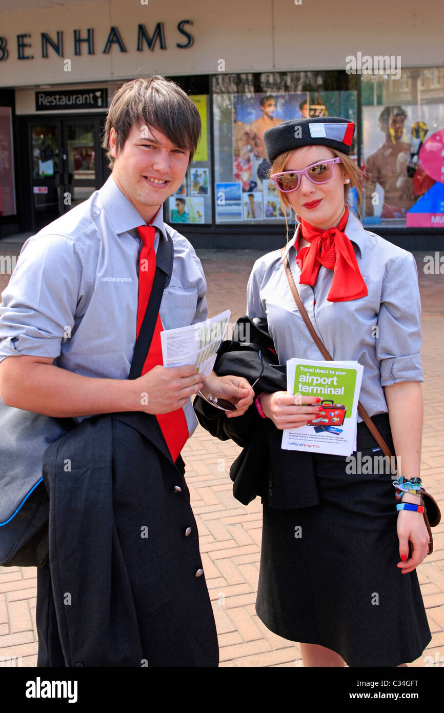 Two National Express Coach firm employees in their uniforms at