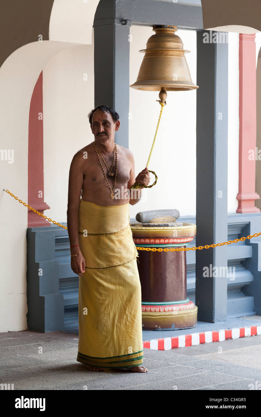 Temple Bell Ringer Sri Mariamman Hindu Temple in Singapore - bell ringer Stock Photo - Alamy