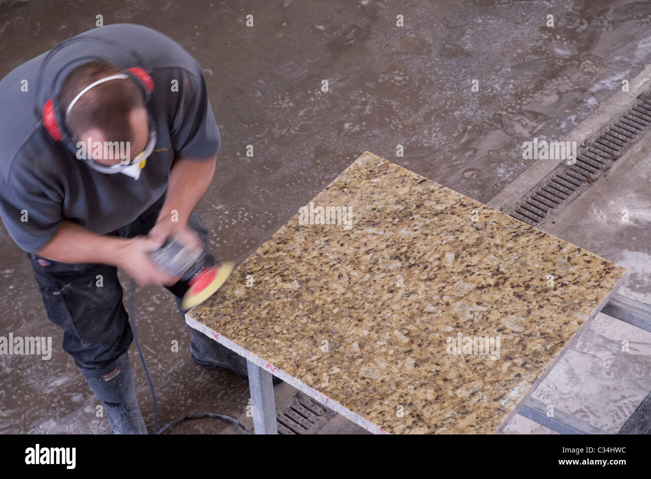 Polishing granite for domestic uses Stock Photo Alamy