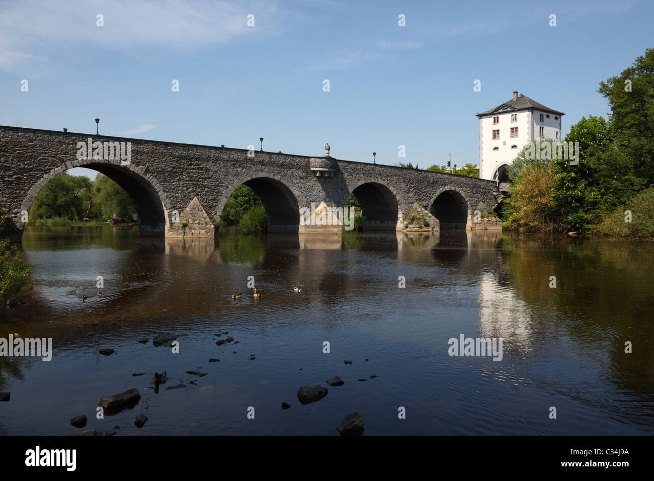 Ancient bridge over the Lahn river in Limburg, Germany Stock Photo
