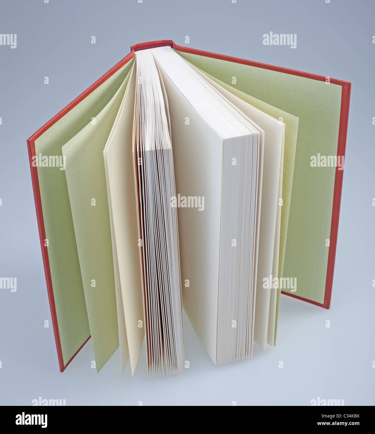 Red, hardcover book open Stock Photo