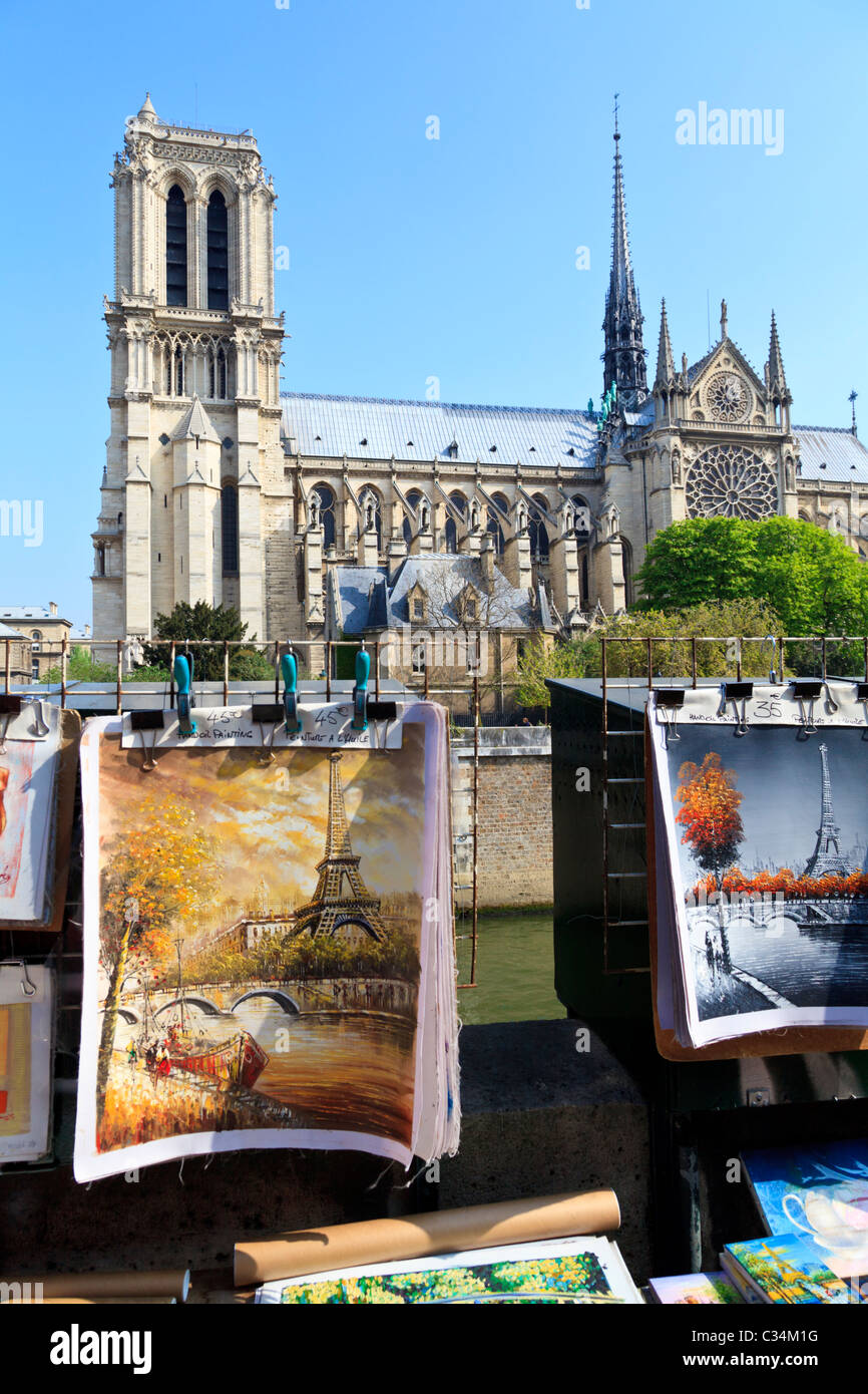 Souvenir art for sale by the banks of the river Seine overlooking Notre Dame, Paris Stock Photo