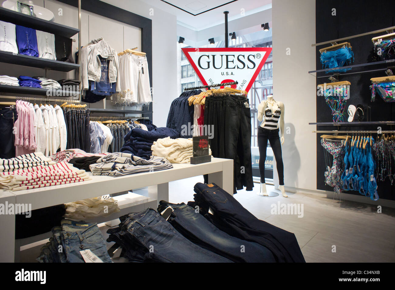 GUESS, the trend setting jeans retailer, opens its new flagship store on Fifth Avenue in New York Photo - Alamy